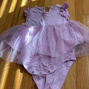 Lavender one piece with attached tutu skirt and snaps